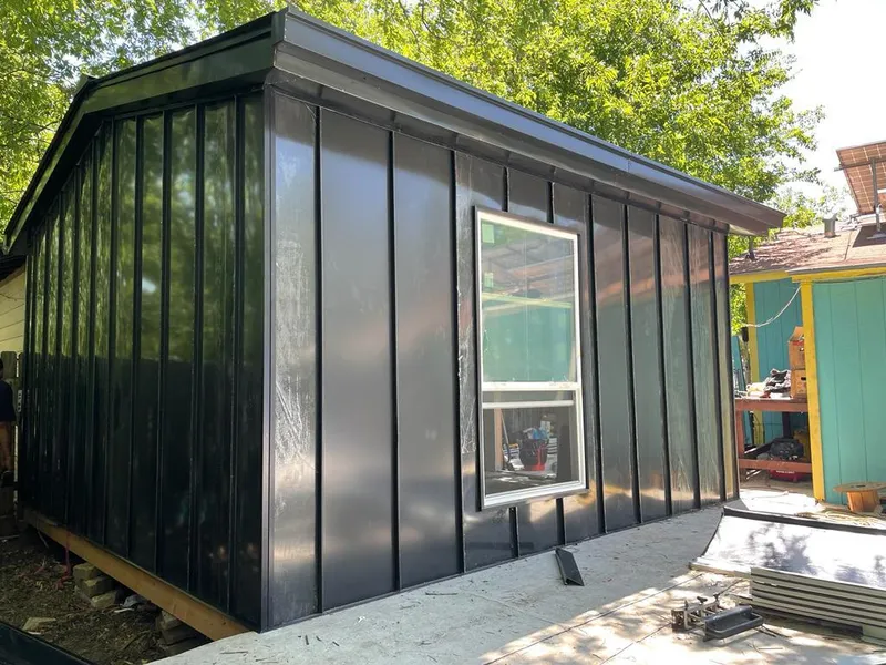 Black standing seam metal wall panels for Metal Roof Installation in Porterville