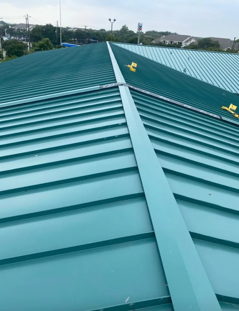 Green commercial metal roof ridge and valley for Metal Roof Repair in Porterville